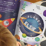 personalised space children's book showing an inside page with the child's name personalised on the pages