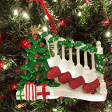 personalised stockings on bannister christmas tree decoration for a family of 4