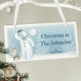 personalised wooden snowman sign showing the personalisation on the front