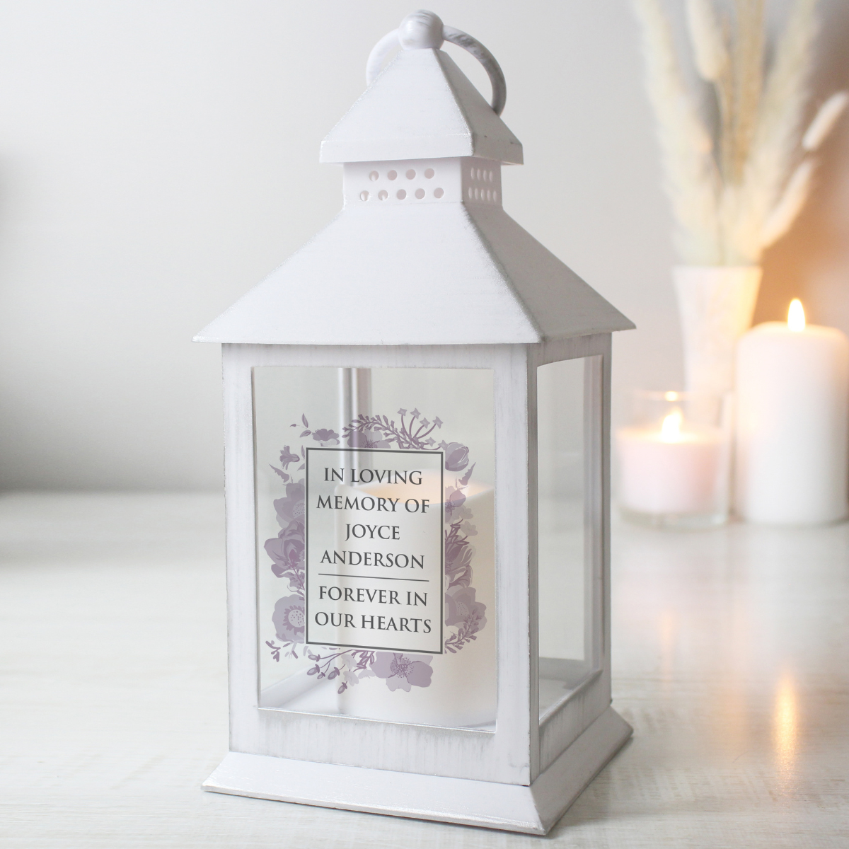 personalised white memorial lantern showing the personalisation on the front of it