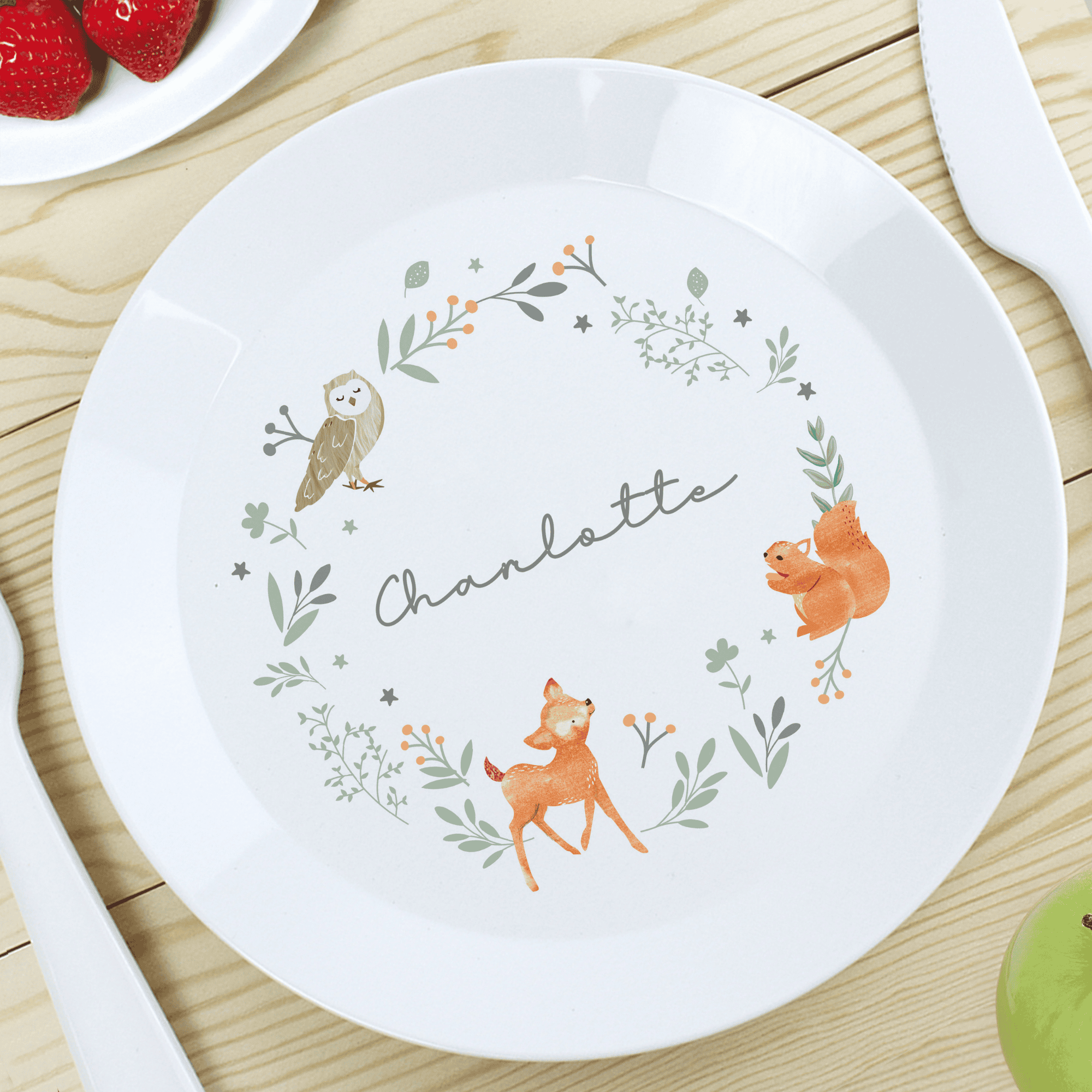 personalised woodland animal toddler plate personalised with any name in the centre around an animal design