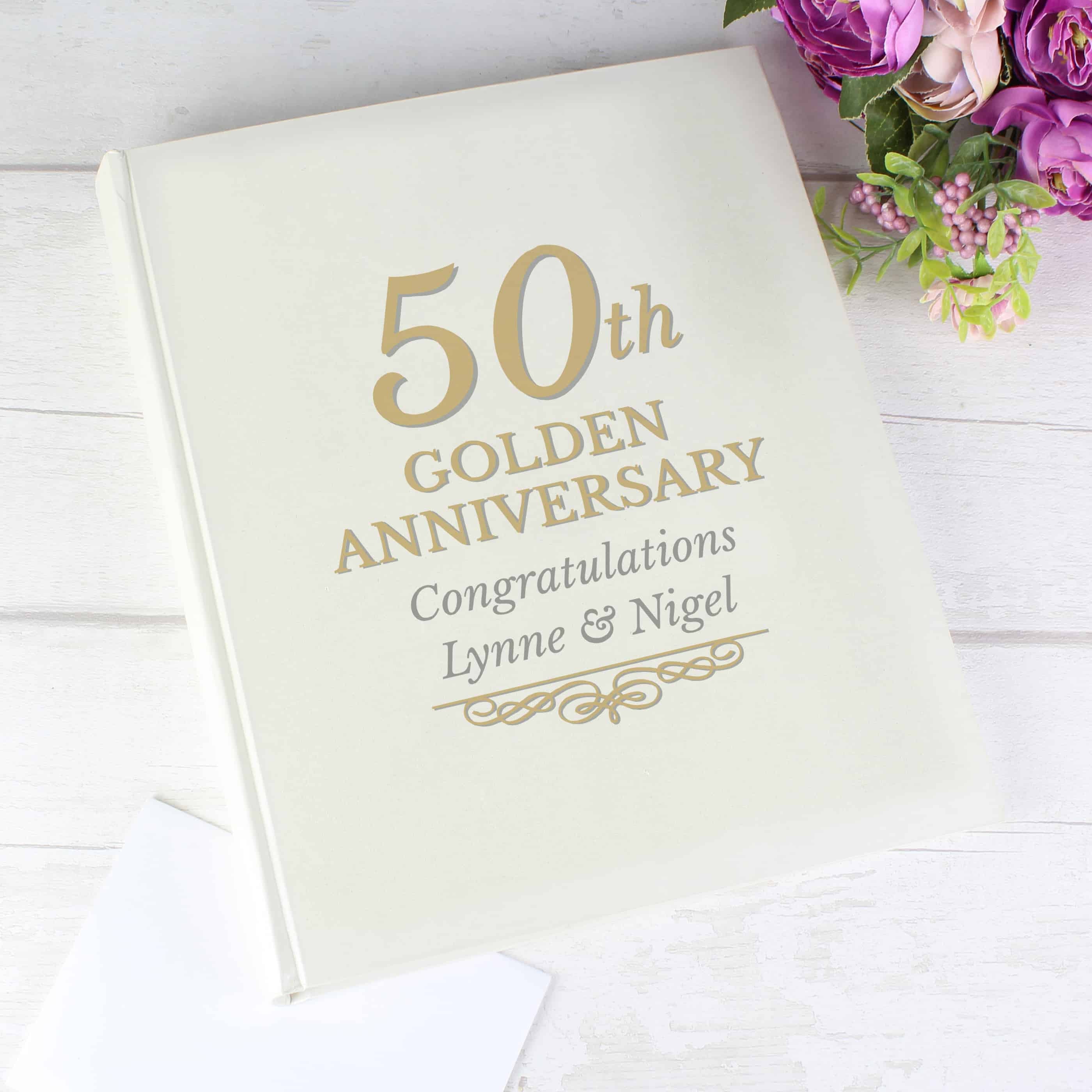 50th wedding anniversary personalised photo album. gold writing on the front and can be personalised over 2 lines. 