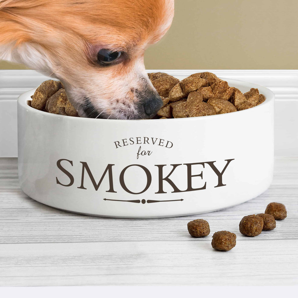 Reserved for...Pet bowl. a white cermaic pet bowl that can have any name personalised on it for a unique gift for a pet from Edinburgh Gift Company, CalEli Gifts.
